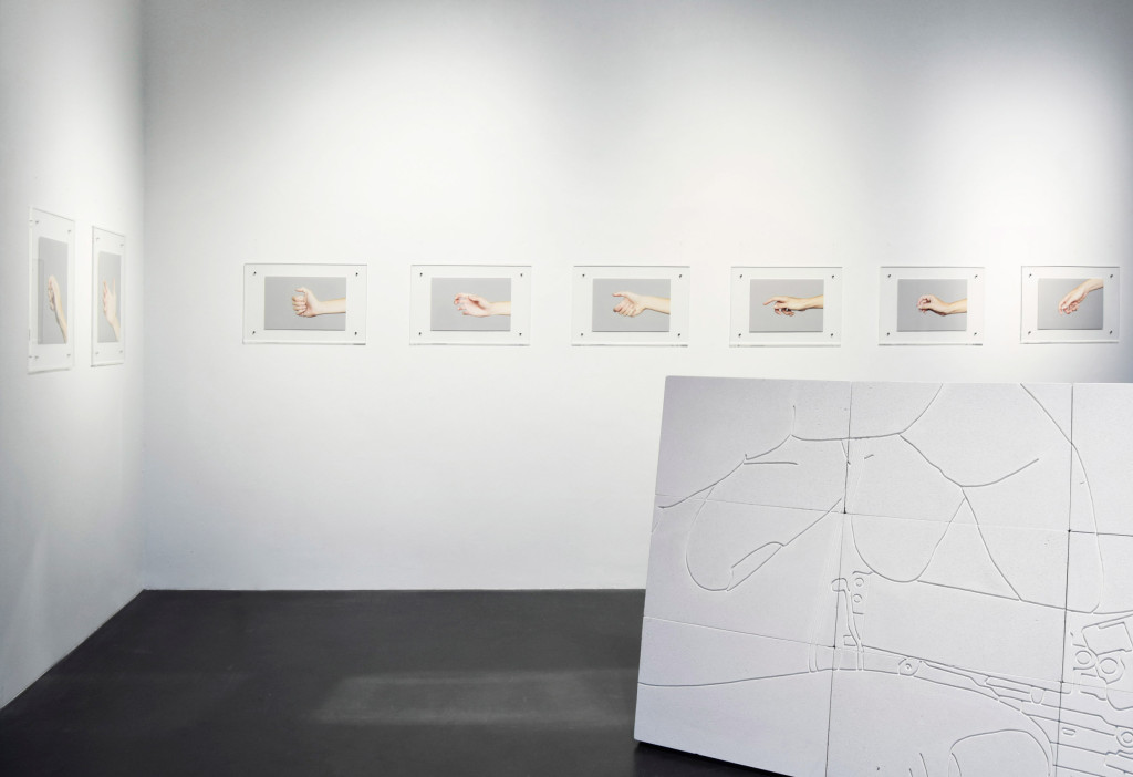 installation view tools photographs hand gestures